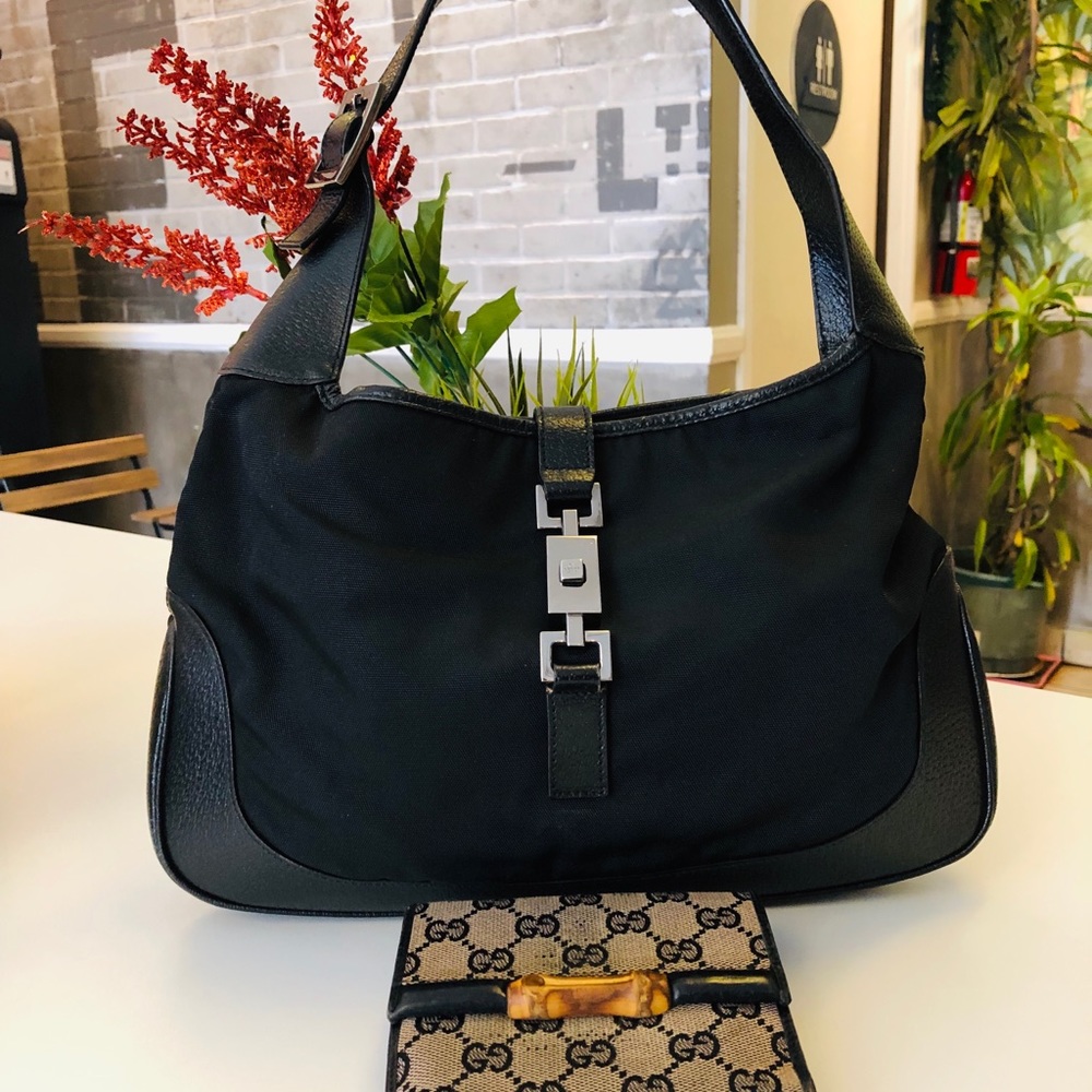 Authentic Gucci handbag and wallet.